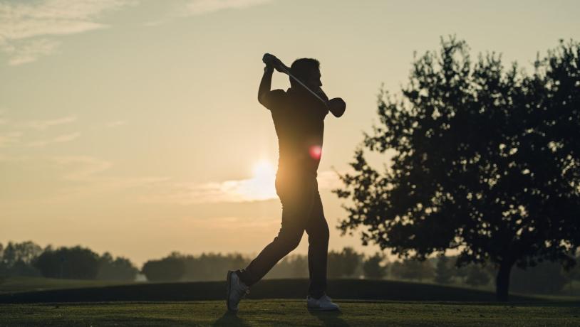 Golfing session during sunset at golf center on Møn, South Zealand