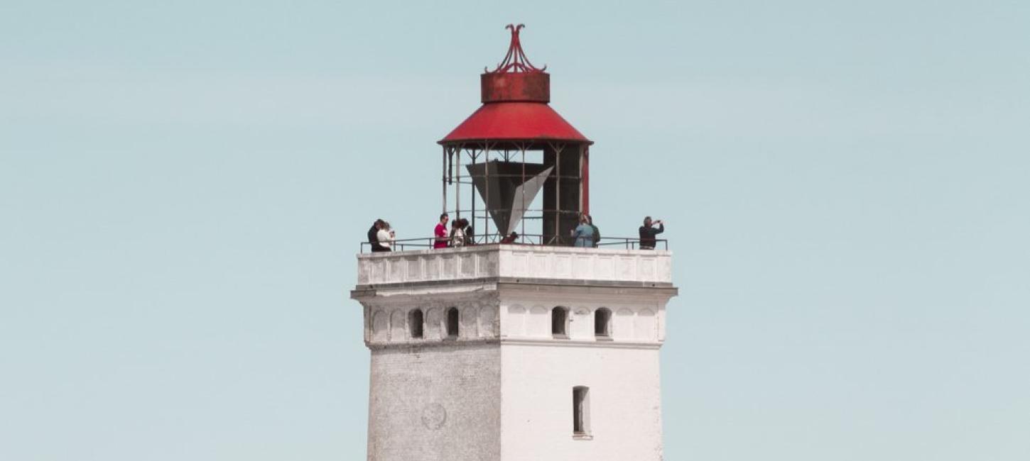 Rubjerg Knude Lighthouse in front of blue sky, North Jutland in Denmark