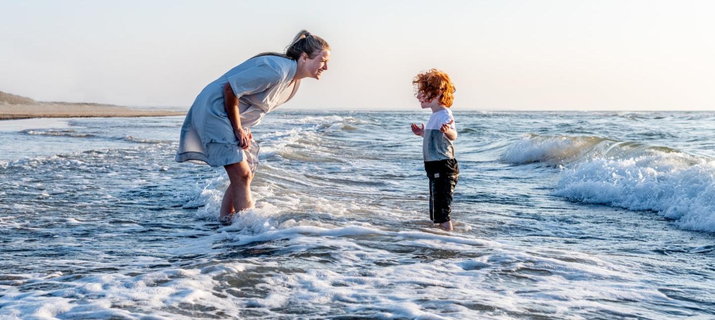 Mother and son at the beach in Blockhus