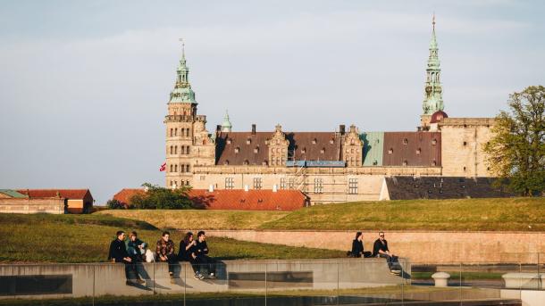 People hanging out in front of Kronborg Castle in Helsingør