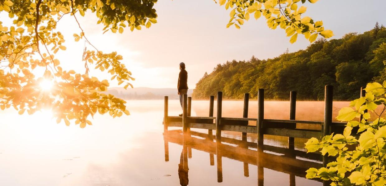 Man standing at the  Borre Sø in the sunset, Silkeborg, Denmark