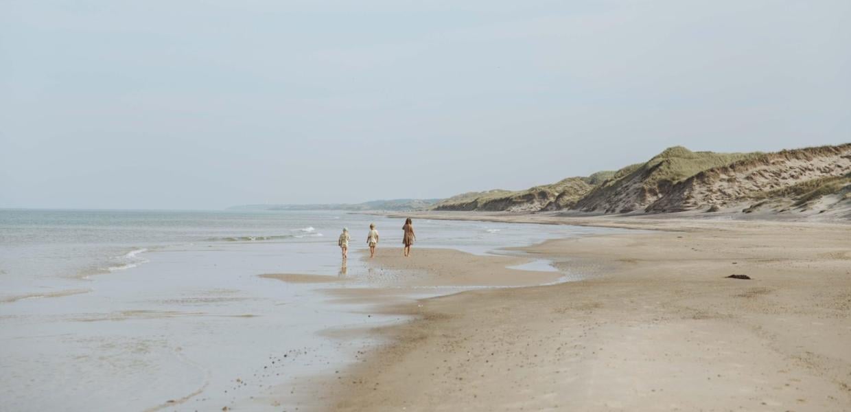 Children running on the beach on Skallerup Strand, Lønstrup