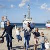 Family playing at Thorup Beach