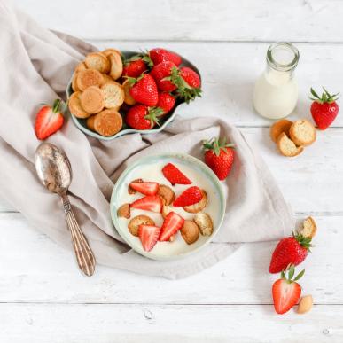 Danish desert  Koldskål  with strawberries on a table