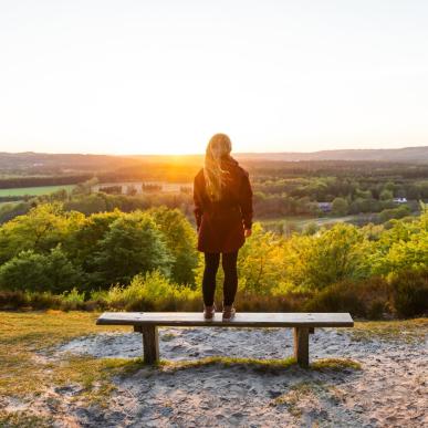 Woman enjoying Sukkertoppen view in East Jutland 