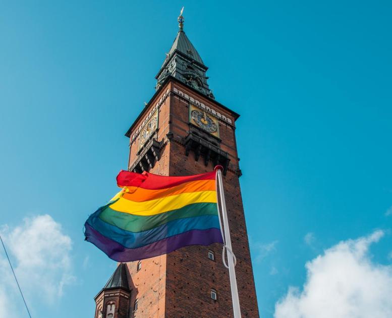 A rainbow flag flies in front of Copenhagen's City Hall to celebrate LGBTQI+ pride week