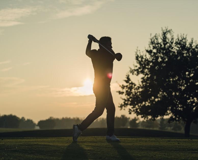 Golfing session during sunset at golf center on Møn, South Zealand