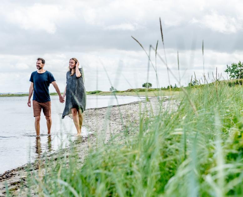 Couple walking on a beach